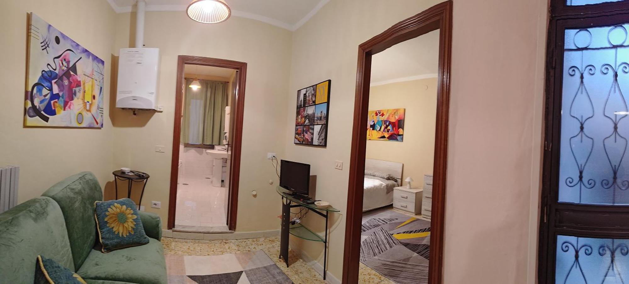 Aparthotel Palazzo Riccardi Solopaca Pokoj fotografie